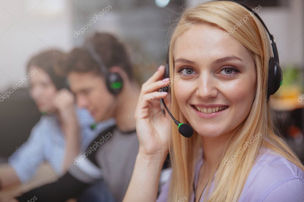 Dispatcher coordinating service calls at a desk