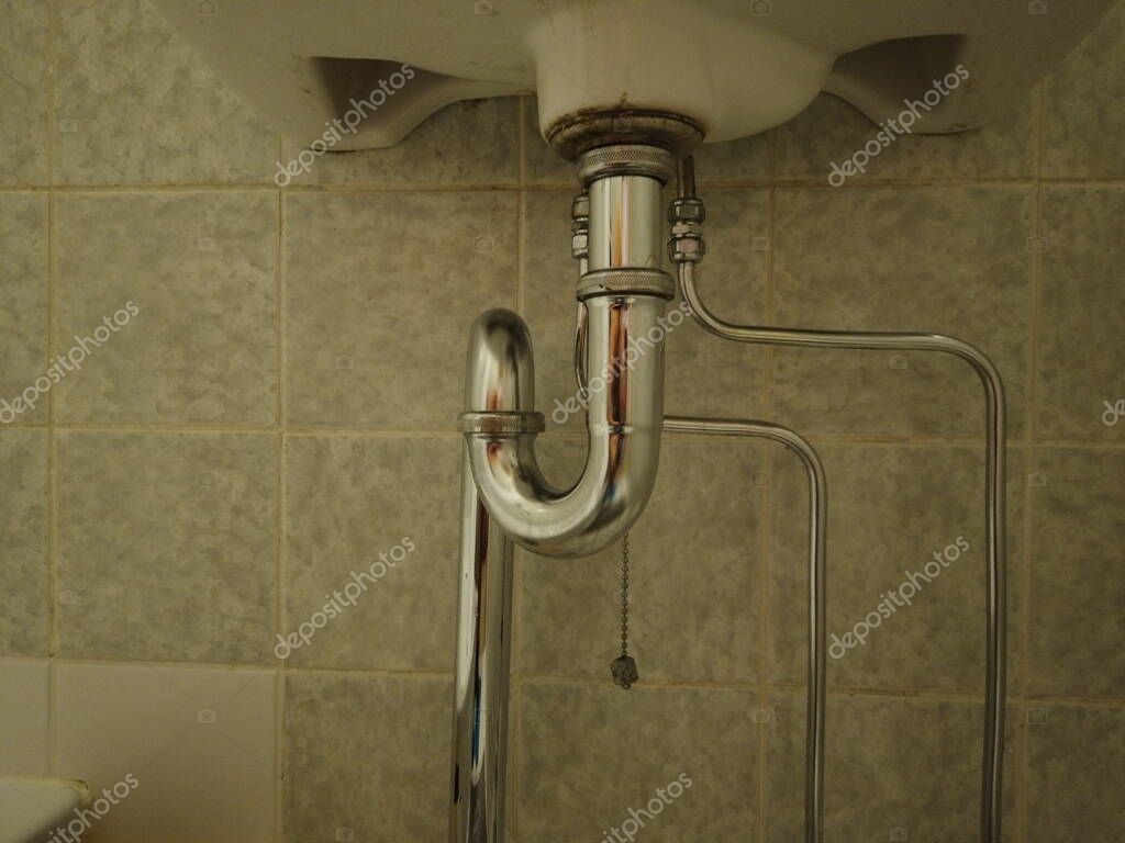 Modern bathroom faucet being installed