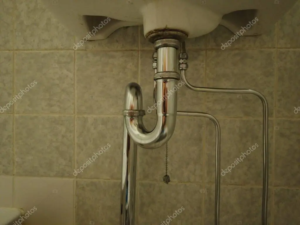 Modern bathroom faucet being installed