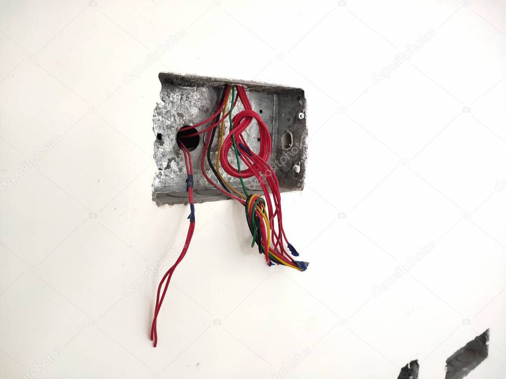 Close-up of electrical wiring and conduit installation