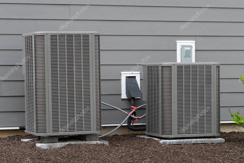 New air conditioning unit installed outside a home