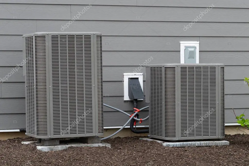 New air conditioning unit installed outside a home